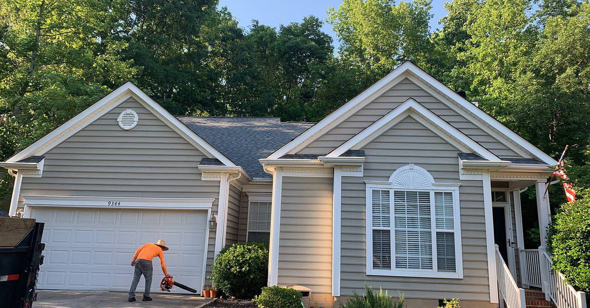 MCI Roofing crew repairing and installing an asphalt shingle roof